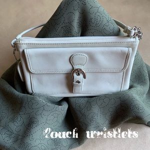 Coach cream leather wristlets